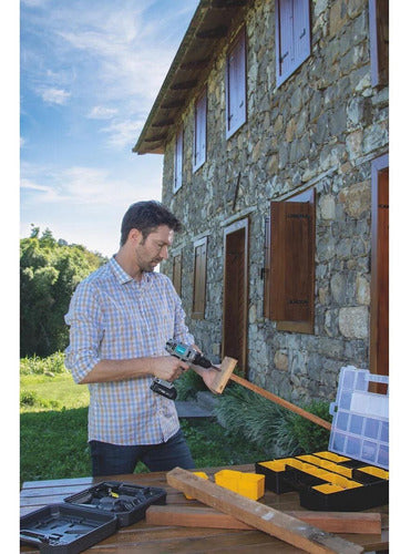 Furadeira E Parafusadeira Tramontina Com Led 12v À Bateria Cinza